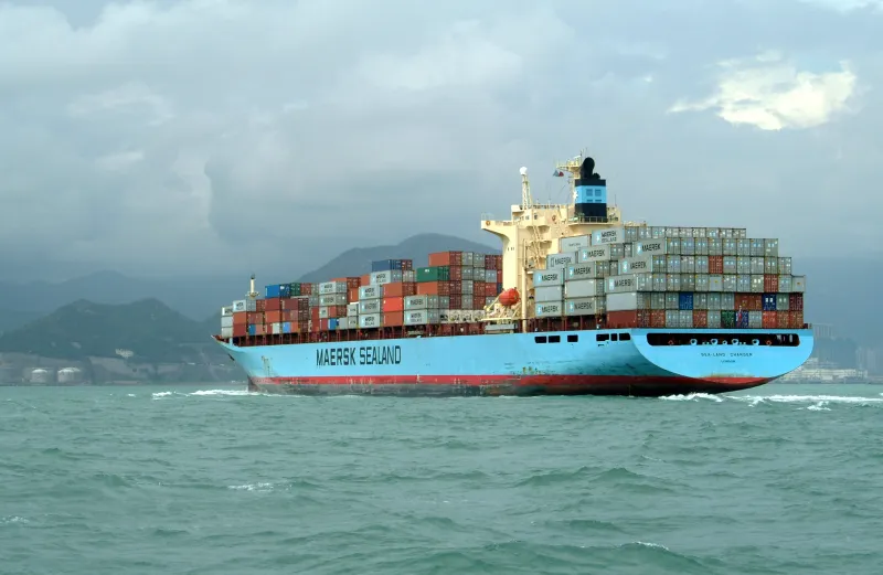 Container ship being loaded at port