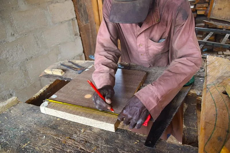 Carpenter working on a furniture piece